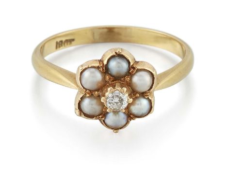 AN EARLY 20TH CENTURY SPLIT PEARL AND DIAMOND CLUSTER RING an old-cut diamond in a high collet setting within a border of spl