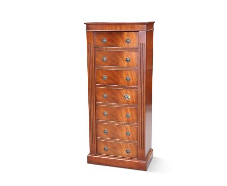 A GEORGIAN STYLE MAHOGANY GUN CASE CABINET the door with seven dummy drawer fronts, the mahogany case housing a steel cabinet