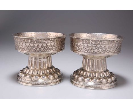 A PAIR OF EDWARDIAN SILVER REPLICAS OF THE TUDOR (HOLMS) CUP by George Nathan &amp; Ridley Hayes, Chester 1906. (2) 10cm high
