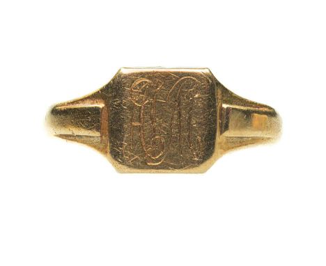 AN 18 CARAT GOLD SIGNET RING monogrammed. Hallmarked Chester 1929, ring size X, 6.7 gramsMonogrammed. Band slightly misshapen