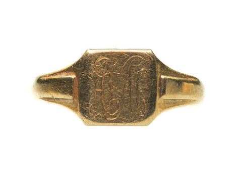 AN 18 CARAT GOLD SIGNET RING monogrammed. Hallmarked Chester 1929, ring size X, 6.7 gramsMonogrammed. Band slightly misshapen