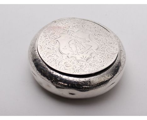 A circular sterling silver table snuff box with scrolling floral decoration, by Joseph Gloster, Birmingham 1908, 2.70ozt.