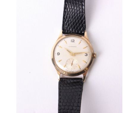 A 9ct gold cased Garrard gentleman's wristwatch, the signed dial with line markers and centre seconds, the case back engraved