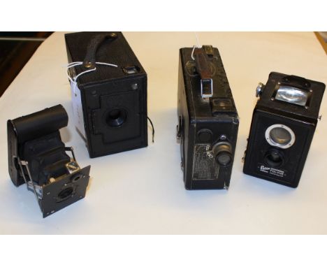 A Cine Kodak Model BB, a Vest Pocket Kodak, an Ensign Box and a Ful-vue camera; together with a cribbage board and several ot