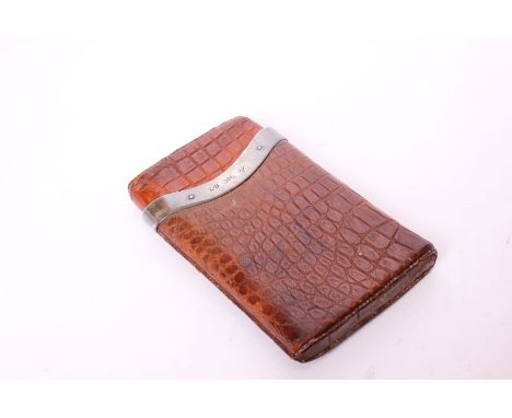 A crocodile skin and sterling silver cigar case by Louis Blumfeld, Birmingham 1892. 