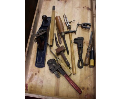 A 19th Century pine chest with carrying handles, containing tools, 94cm.
