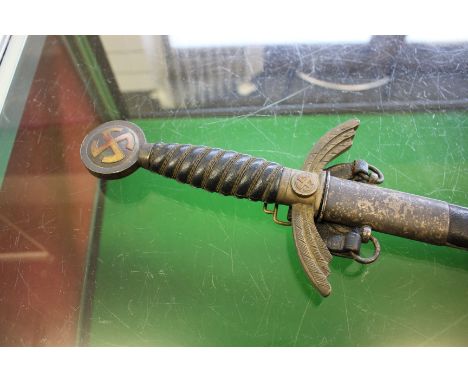 A German WWII Luftwaffe Officer's dress sword, the 30.30 inch blade by Paul Weyersberg of Solingen, stamped '5', in brass and