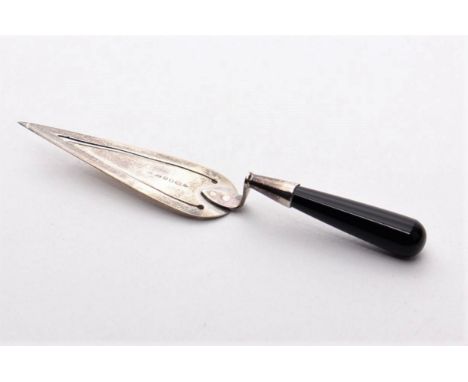 A sterling silver bookmark in the shape of a stonemasons or gardeners trowel, by Ari D, Norman, London 1988.