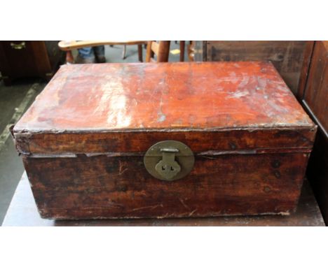 A Chinese lacquered trunk, with carrying handles, 75cm wide, from the recent BBC production of Poldark filmed in Bristol