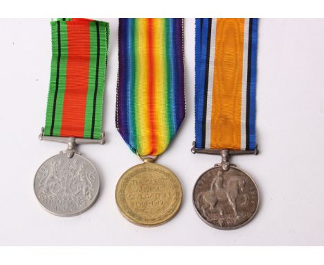 Two First World War medals: a 1914-19 medal and George medal to 115575 GNR J. Barton RA.; together with a 39-45 medal (3).