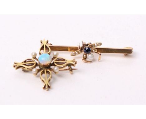 A 15ct gold quatrefoil brooch with central cabochon opal and four split pearl accents, marked with reg number: 25099; togethe