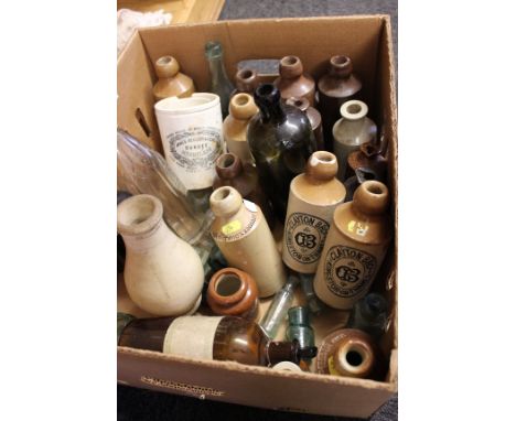 A collection of Victorian and later ceramic and glass bottles and jars. 