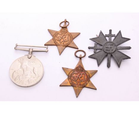 A World War II medal group, 1939-45 medal, 1939-45 Star, France and Germany; together with a World War II German War Merit Cr