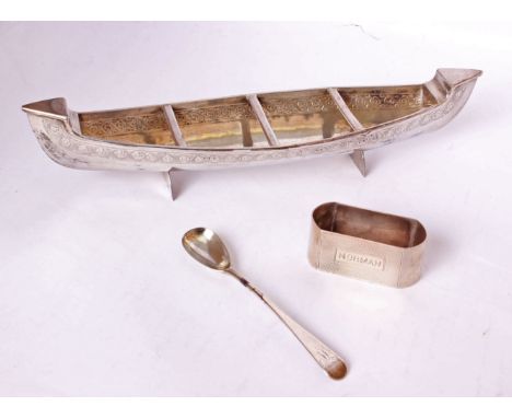 An engine turned sterling silver napkin ring; together with a Georgian egg spoon and a white metal boat, 6ozt. 