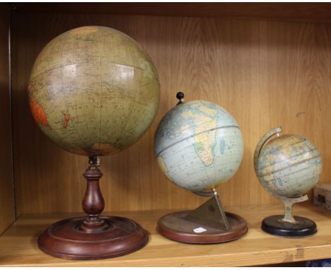 Early 20th century E J Arnold &amp; Sons Ltd 9 inch terrestrial globe on stained pine base, with two smaller tin globes.