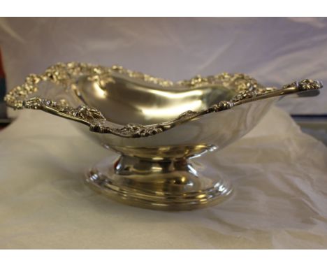 An American silver footed bowl, with cast floral rim in the 'Talisman Rose' pattern by Frank M. Whiting &amp; Company, 42ozt.