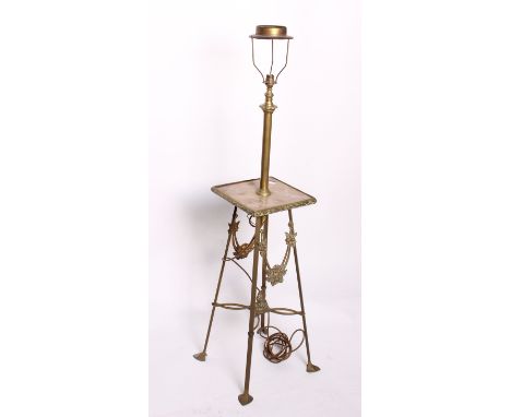 A Victorian brass standard lamp, 129cm high and a brass standard lamp, 156cm high.