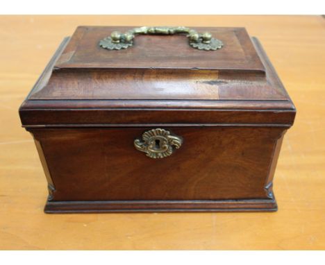 An 18th Century mahogany tea caddy with a later fitted interior, 25cm.