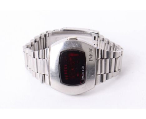 A Tiffany &amp; Co. Pulsar stainless steel digital LED wristwatch, circa 1973, Horizontal Tonneau, screw back case 30578 32 x