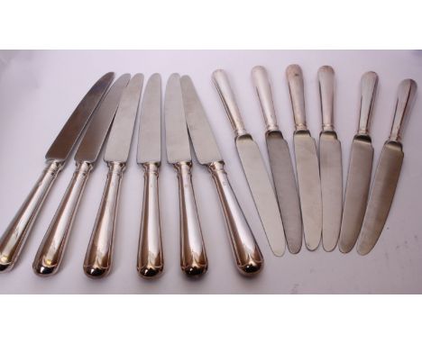 A set of twelve silver handled knives by Strickett &amp; Loder, Sheffield 1976.