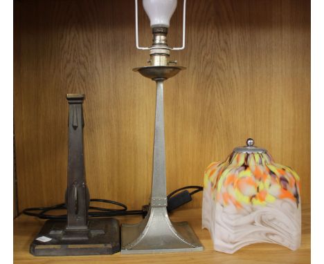 An Arts &amp; Crafts Cornish tin lamp base with an associated glass shade, other Arts and Crafts lamp bases, and a classical 