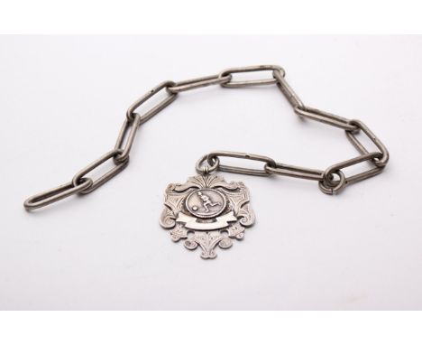 A sterling silver football pendant/medal, on a sterling silver chain, Birmingham 1912, 2.1ozt.