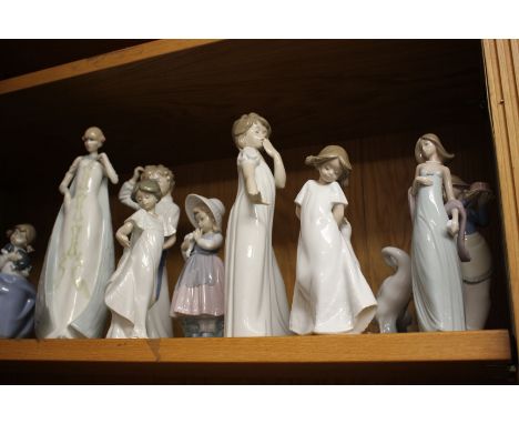 A collection and Nao figures together with a of Lladro figure and a Royal Doulton Reflections figure (13)