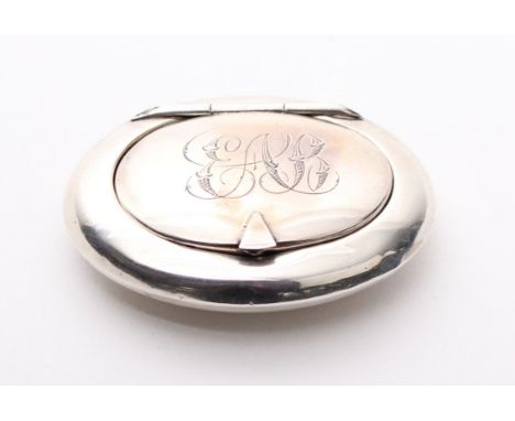 A sterling silver pocket snuff box, oval form with monogrammed top by William Tandy &amp; Son, Chester 1917.