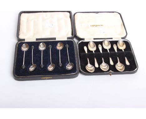 A cased set of six silver coffee spoons, Walker &amp; Hall, Sheffield, 1925 and a further set (2)