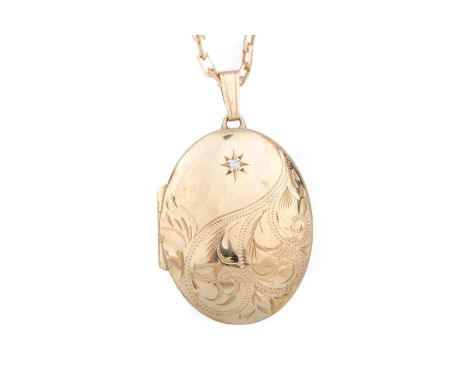 GOLD LOCKET ON CHAIN the locket set with a small diamond, in nine carat goldQty: 8.5g