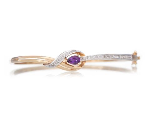 AMETHYST AND DIAMOND BANGLE in nine carat gold Qty: 8.6g