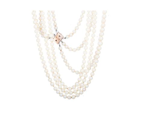 PEARL THREE STRAND NECKLACE with lapis lazuli clasp marked 14K