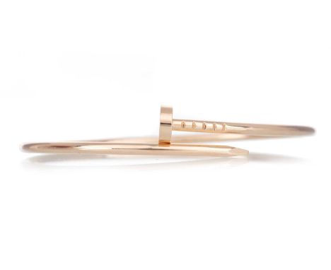 CARTIER JUSTE UN CLOU BANGLE AMENDMENT: DOES NOT COME WITH CERTIFICATE.small model, size 17, numbered KBO334, in eighteen car