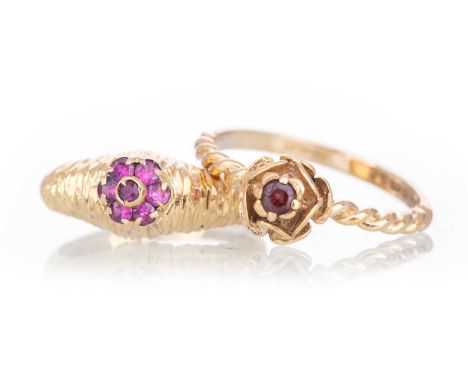 GARNET ROSE MOTIF RING  ALONG WITH A RUBY CLUSTER RING each in nine carat gold, size P and LQty: 4.2g gross (2)