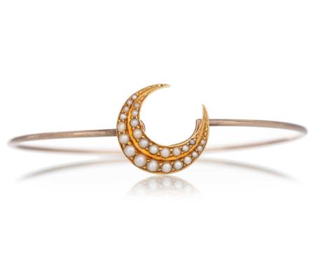 EDWARDIAN BANGLE UNMARKED  formed with a crescent of seed pearls, raised over a tubular bandQty: 4.6g