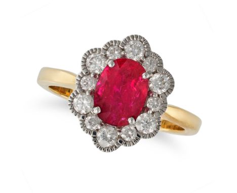 A RUBY AND DIAMOND CLUSTER RING in 18ct yellow gold, set with an oval cut ruby of 1.48 carats in a cluster of round brilliant