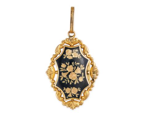 AN ANTIQUE ENAMEL LOCKET PENDANT in yellow gold, the hinged locket in foliate design decorated with black enamel, opening to 