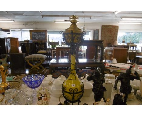 A CAST METAL STANDING LAMP AND A HANGING LANTERN