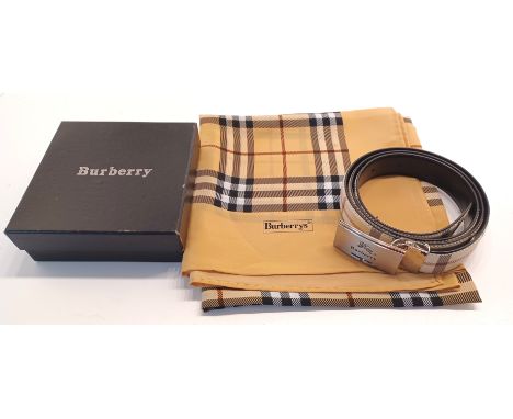 A BURBERRY STYLE TARTAN BELT AND SILK SCARF.