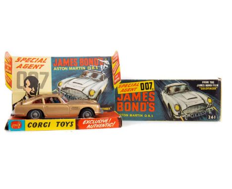 CORGI JAMES BOND ASTON MARTIN NO. 261,with Secret Instructions and extra figure in packet, boxed with card displaySome light 