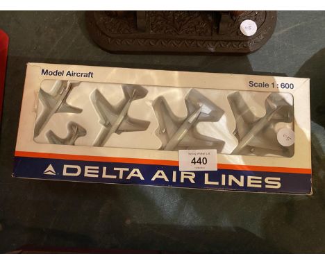 A RARE BOX OF FIVE DELTA AIRLINES DIE CAST PLANES 