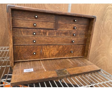 A SMALL VINTAGE M&amp;W WATCH MAKER/ENGINEER'S TOOL CHEST ENCLOSING FOUR SHORT AND THREE LONG DRAWERS 