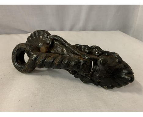 A VICTORIAN BLACK DOOR KNOCKER 