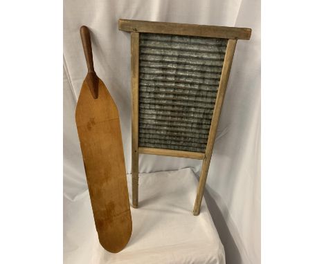 A VINTAGE SKIFFLE BOARD AND A VINTAGE CROUPIERS PADDLE 