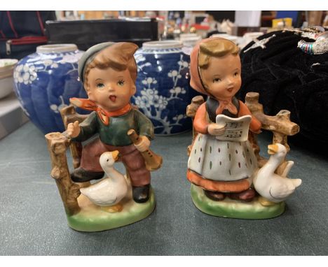 A PAIR OF WEST GERMAN GOEBEL FIGURES 