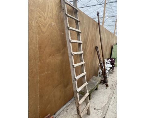 A VINTAGE WOODEN 12 RUNG LADDER 