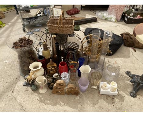 AN ASSORTMENT OF CERAMIC AND GLASS VASES TO ALSO INCLUDE WICKER BASKETS AND CANDLE HOLDERS ETC 