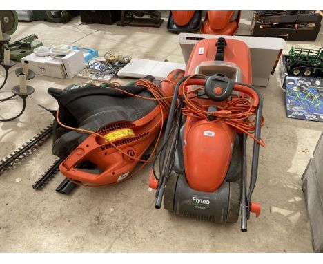 AN ASSORTMENT OF GARDEN TOOLS TO INCLUDE A FLYMO LAWN MOWER, A FLYMO GARDEN VAC AND THREE ELECTRIC HEDGE CUTTERS 