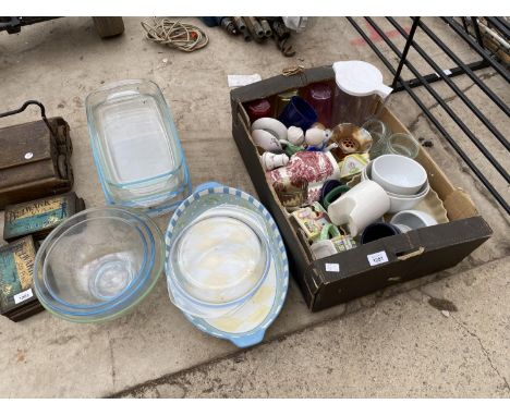 AN ASSORTMENT OF CERAMIC AND GLASS WARE TO INCLUDE JUGS, TEAPOTS AND DISHES ETC 