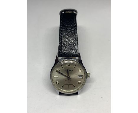 A VINTAGE RUSSIAN WRIST WATCH WITH LEATHER STRAP IN WORKING ORDER 
